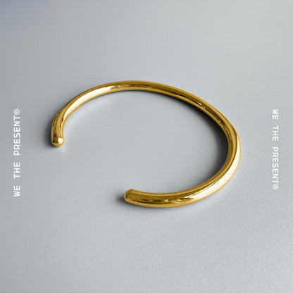 We The Present Tubular Gold Bangle