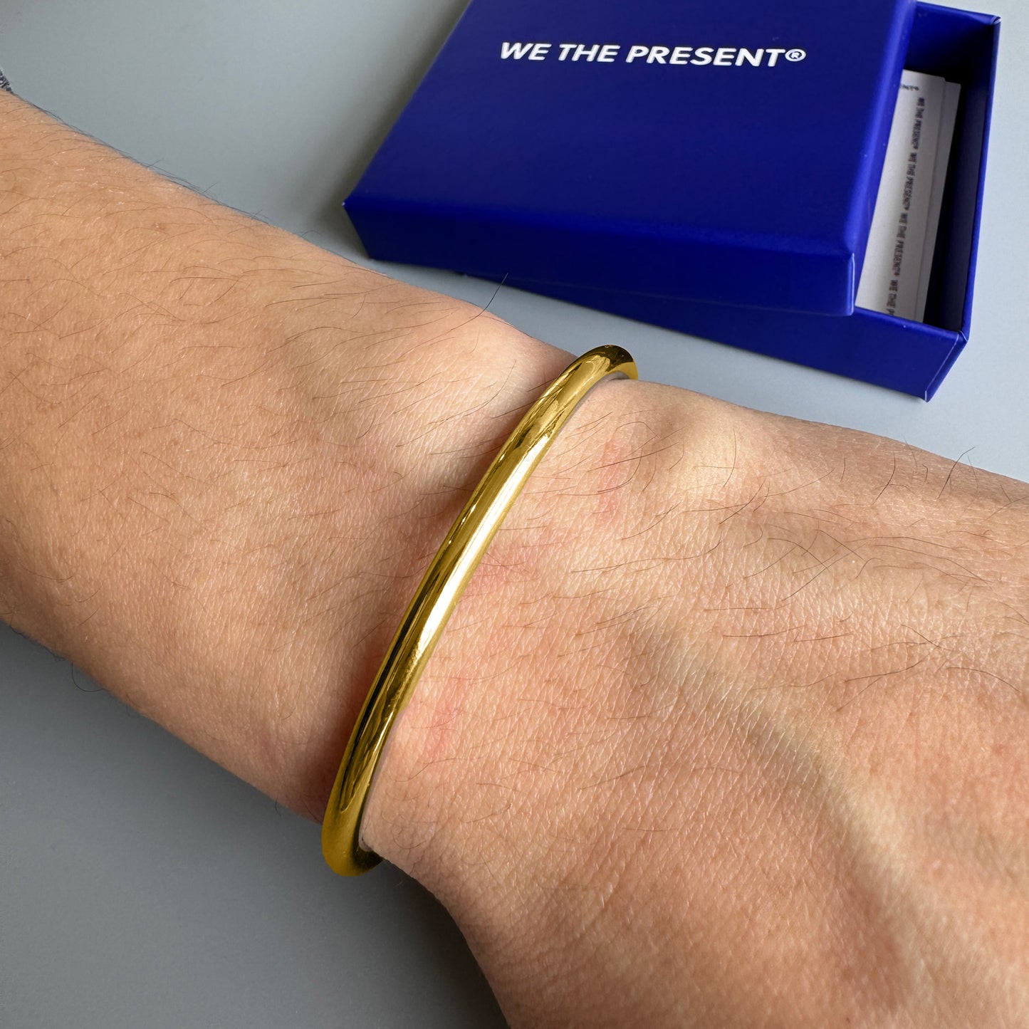 We The Present Tubular Gold Bangle