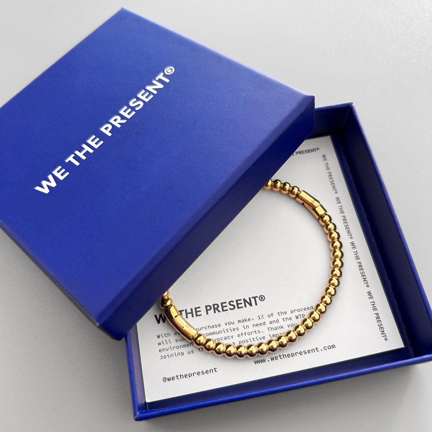 We The Present Balls Gold Bangle